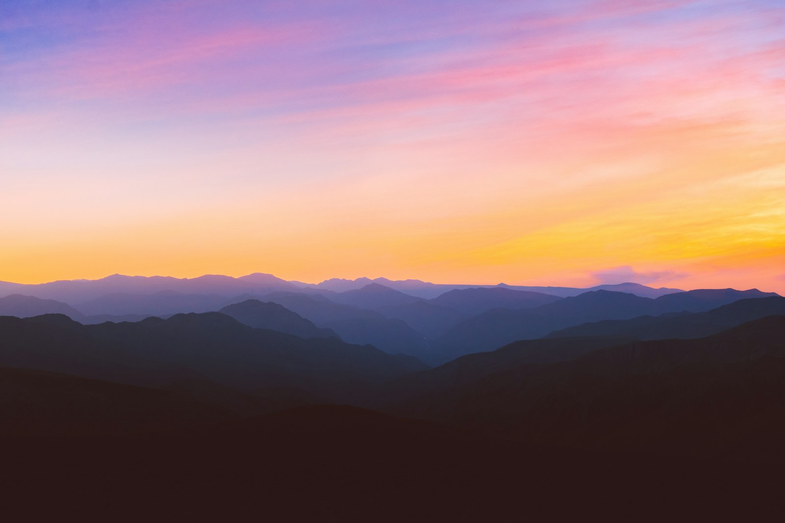 silhouette photo of mountain during golden hour