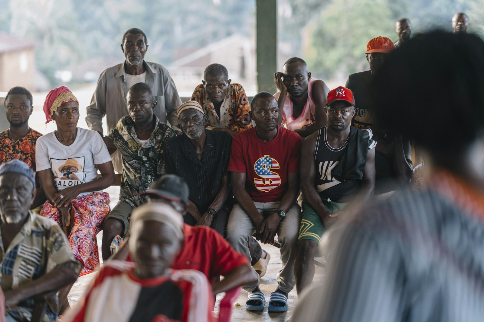A group of people sitting and watching something