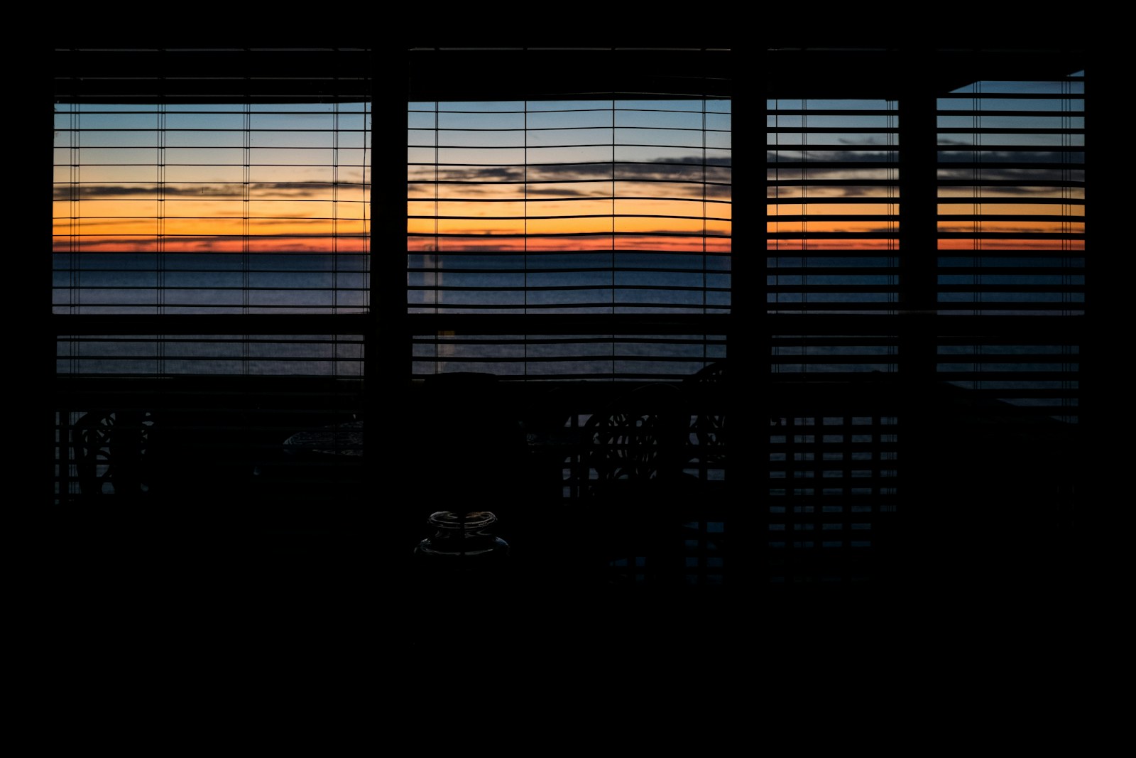 silhouette of window during sunset