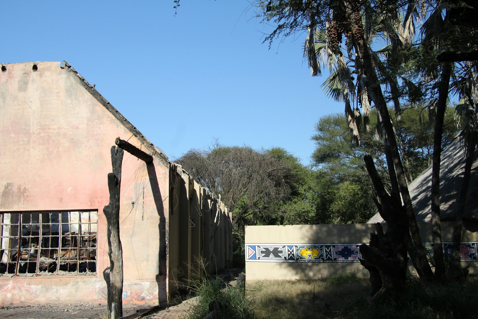 a building with a window and a gate