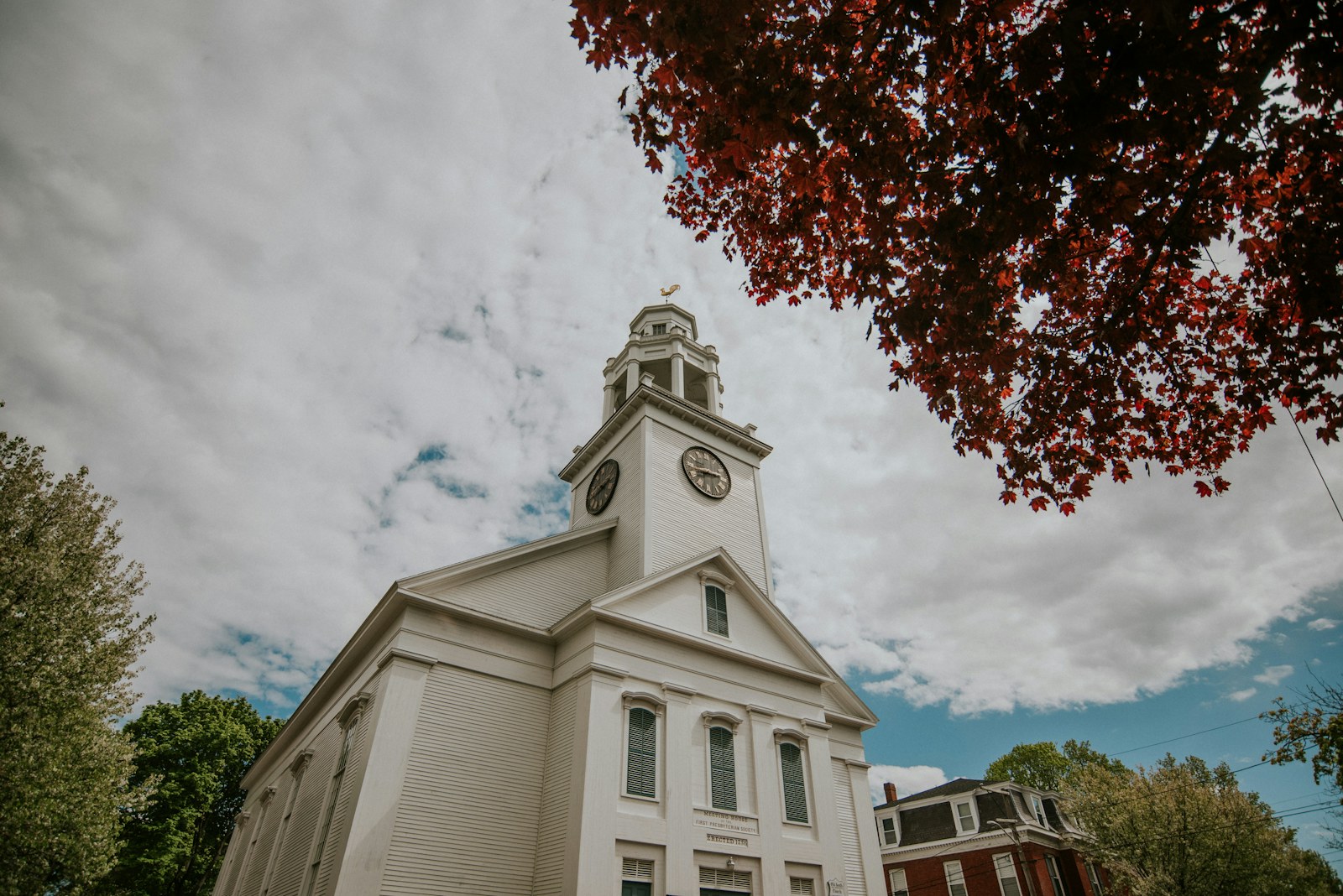 beige church near trees