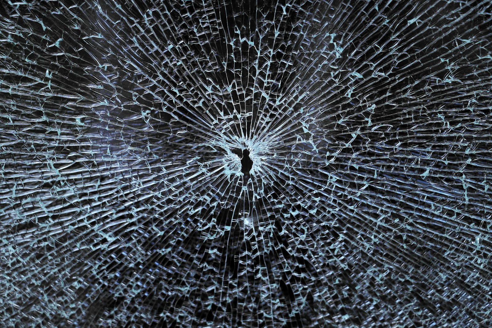 Shattered glass with a central impact point of impact