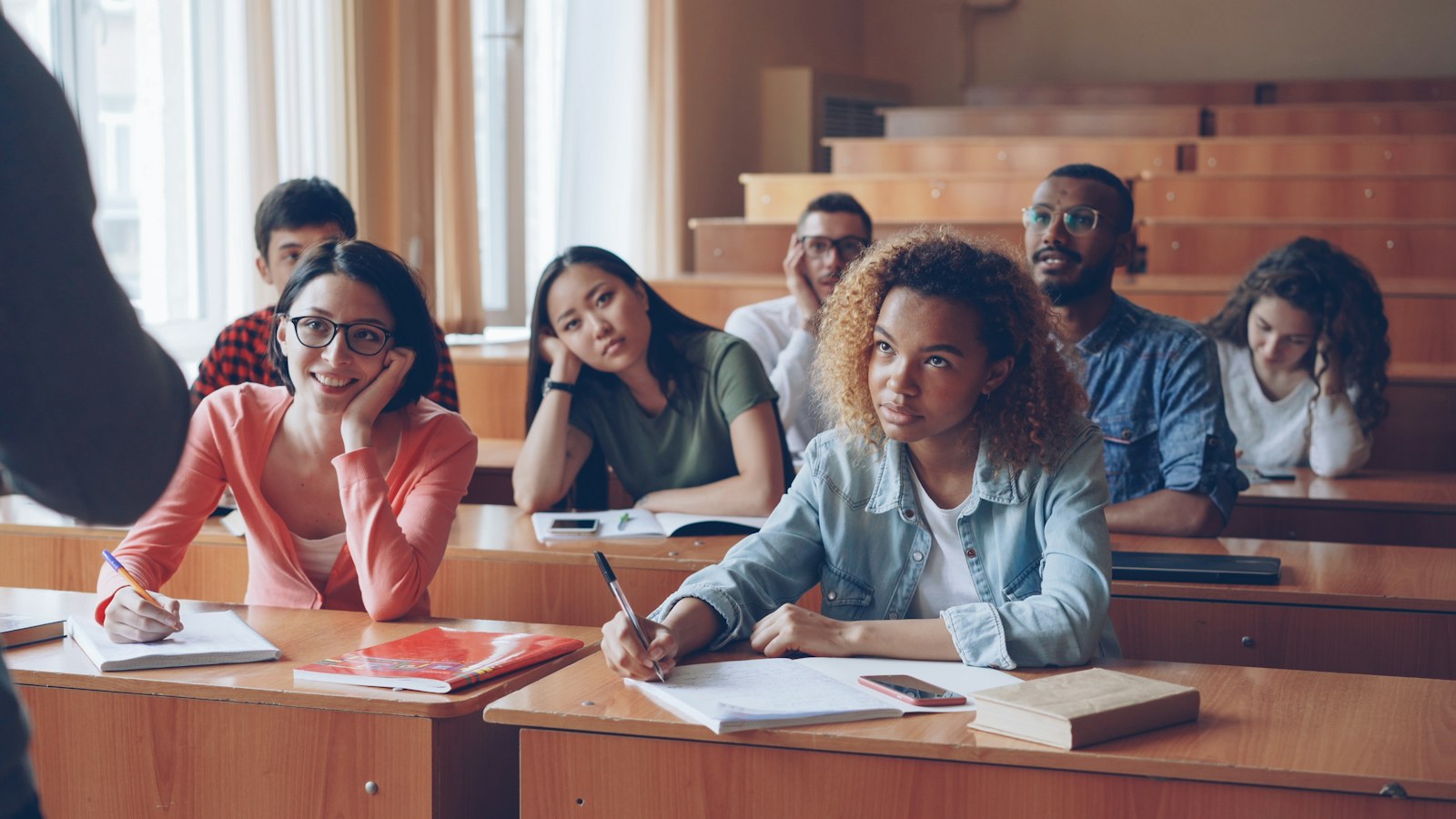 Students attentively listening in a lecture hall