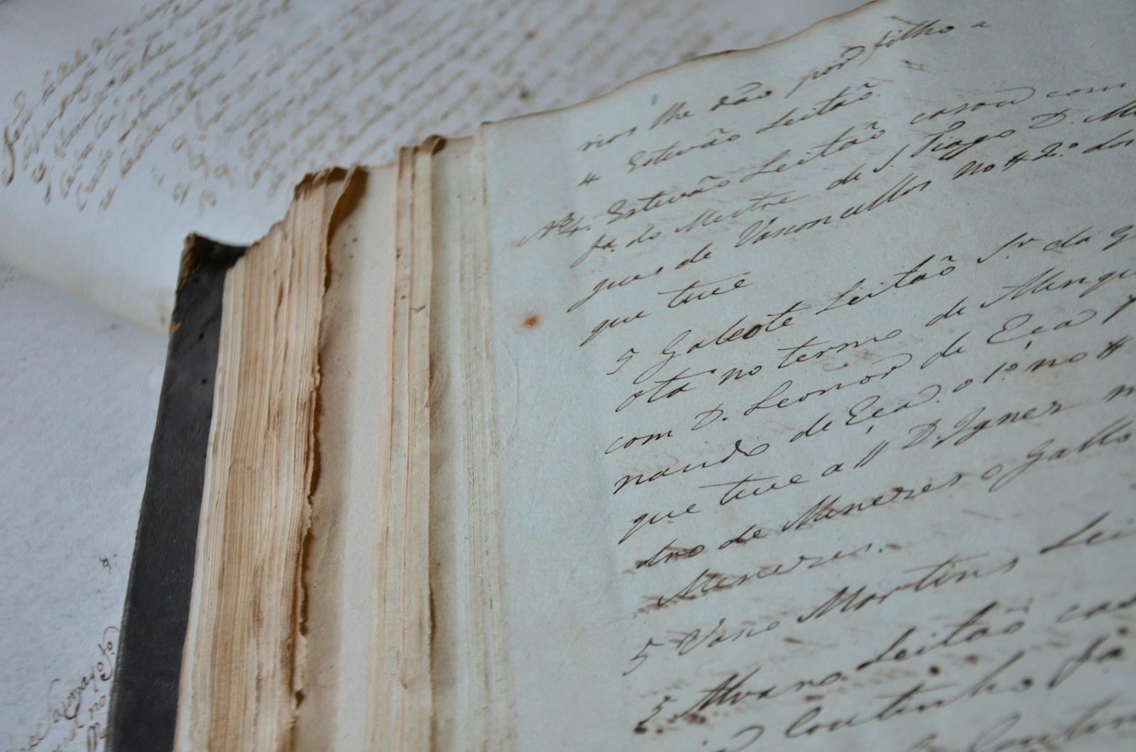 an old book with writing on it